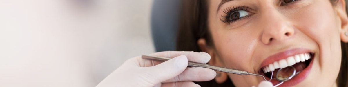Woman having teeth examined at dentists Woman having teeth examined at dentists